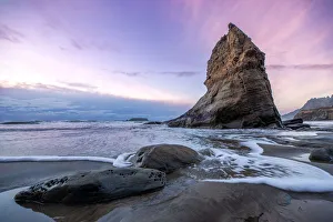 Sunset Ocean View Prints: A Seastack with a subtle sunset on the ocean