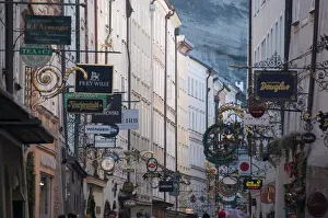 Signs in Getreidegasse, the main shopping street, Salzburg, Austria, Europe Signs in Getreidegasse, the main shopping street, Salzburg, Austria, Europe