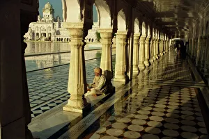 Sikh elder at prayer at the Golden Temple of Amritsar Sikh elder at prayer at the Golden Temple of Amritsar