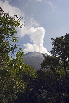 Smoke rises from the active crater of Tungurahua Volcano that threatens the nearby resort Smoke rises from the active crater of Tungurahua Volcano that threatens the nearby resort