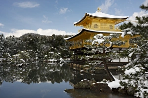 Snow-covered Kinkaku-ji (Temple of the Golden Pavilion) (Rokuon-ji), UNESCO World Heritage Site Snow-covered Kinkaku-ji (Temple of the Golden Pavilion) (Rokuon-ji), UNESCO World Heritage Site