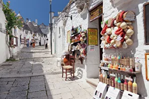 Souvenir shop on street of Trulli, traditional houses, Rione Monti area, Alberobello Souvenir shop on street of Trulli, traditional houses, Rione Monti area, Alberobello