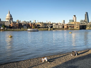 St. Pauls and City skyline, beach beside the River Thames, London, England, United Kingdom St. Pauls and City skyline, beach beside the River Thames, London, England, United Kingdom