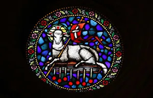 A stained glass window of Christ the Lamb in St. Matthias church, Budapest, Hungary A stained glass window of Christ the Lamb in St. Matthias church, Budapest, Hungary