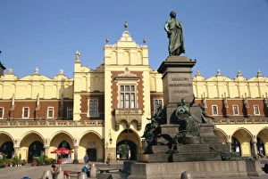 Statue of Adam Mickiewicz in front of the Cloth Hall Statue of Adam Mickiewicz in front of the Cloth Hall
