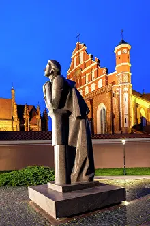 Prints of A Statue of the Polish Poet Adam Mickiewicz in front of St. Anne's Church and the Church of St. Francis and St. Bernard, Vilnius, Lithuania Vilnius Prints: Adam Mickiewicz Statue Print, Vilnius Lithuania