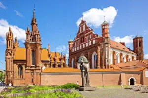 Prints of A Statue of the Polish Poet Adam Mickiewicz in front of St. Anne's Church and the Church of St. Francis and St. Bernard, Vilnius, Lithuania Vilnius Prints: Adam Mickiewicz Statue Print, Vilnius, Lithuania