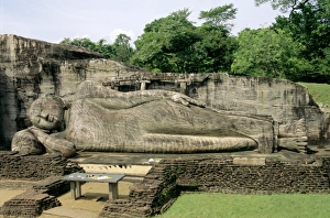 Buddhist Sculpture In Asia Prints: Statue of the reclining Buddha, attaining nirvana