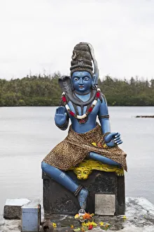 Statue of Vishnu, the Hindu god with cobra and wearing a leopardskin, in human form as Krishna, at Ganga Talao Statue of Vishnu, the Hindu god with cobra and wearing a leopardskin, in human form as Krishna, at Ganga Talao