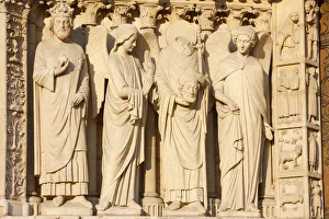 Prints of Statues including the Emperor Constantine and St. Denis carrying his head, Virgins Gate, west front, Notre Dame Cathedral, UNESCO World Heritage Site, Paris, France, Europe Notre Dame De Paris Prints: Statue Print of Emperor Constantine and St. Denis