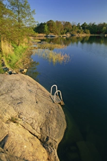 Scandinavian Outdoor Photography Prints: Steps placed beside lake to help bathers