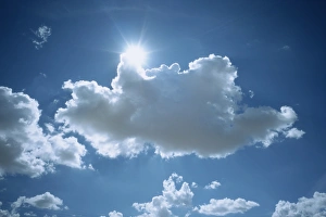 Sun emerging from behind cloud Sun emerging from behind cloud