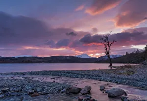 Sun setting over Ben Lomond and Loch Ard near Aberfoyle in the Lomond Trossachs National Sun setting over Ben Lomond and Loch Ard near Aberfoyle in the Lomond Trossachs National
