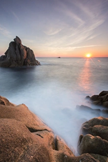 Capo Testa Sardinia Prints: The sun setting behind the rocks of the peninsula of Capo Testa