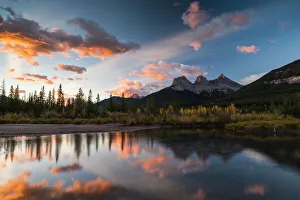 Sunrise in autumn at Three Sisters Peaks near Banff National Park, Canmore, Alberta Sunrise in autumn at Three Sisters Peaks near Banff National Park, Canmore, Alberta