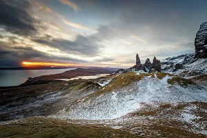 Sunrise breaks through on to a wintery landscape at the Old Man of Storr, Isle of Skye Sunrise breaks through on to a wintery landscape at the Old Man of Storr, Isle of Skye
