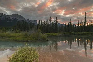 Sunset over Ha Ling Peak and Mount Rundle at Policemans Creek, Canmore, Alberta Sunset over Ha Ling Peak and Mount Rundle at Policemans Creek, Canmore, Alberta