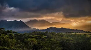 Pacific Island Landscapes Prints: Sunset light streaking through mountains, Kauai, Hawaii, United States of America