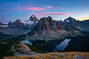 Sunset on top of Nub Peak, looking at Mount Assiniboine and the moon Sunset on top of Nub Peak, looking at Mount Assiniboine and the moon