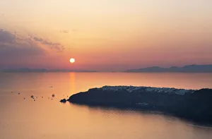 Sunset over Oia from Imerovigli, Santorini, Cyclades Islands, Greek Islands, Greece Sunset over Oia from Imerovigli, Santorini, Cyclades Islands, Greek Islands, Greece
