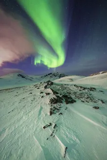 Surreal shapes of the Northern Lights (Aurora Borealis) in the Arctic night, Skarsvag Surreal shapes of the Northern Lights (Aurora Borealis) in the Arctic night, Skarsvag