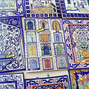 Tiles decorated with Tunisian doorways on souvenir stall, Hammamet, Cap Bon Tiles decorated with Tunisian doorways on souvenir stall, Hammamet, Cap Bon
