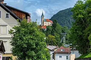 Prints of Tourists explore the historic mercury mine of Idrija while admiring surrounding landscapes in Slovenia on a clear day Slovenia Prints: Idrija Mercury Mine Print