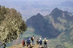 Simien National Park Collection: Tourists trekking, Simien Mountains National Park, UNESCO World Heritage Site