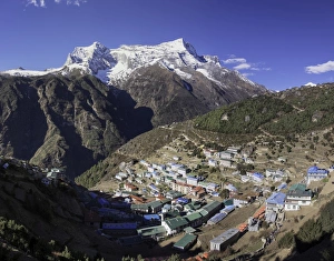 The town of Namche Bazaar with the Kongde Ri (Kwangde Ri) mountain range in the background, Himalayas, Nepal, Asia The town of Namche Bazaar with the Kongde Ri (Kwangde Ri) mountain range in the background, Himalayas, Nepal, Asia