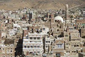 Traditional ornamented brick architecture on tall houses, Old City, within Sana'a Traditional ornamented brick architecture on tall houses, Old City, within Sana'a