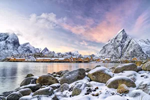Traditional Rorbu in the fishing village of Sakrisoy at sunset in winter, Reine, Nordland county, Lofoten Islands Traditional Rorbu in the fishing village of Sakrisoy at sunset in winter, Reine, Nordland county, Lofoten Islands