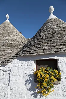 Traditional trullos (trulli) in Alberobello, UNESCO World Heritage Site, Puglia, Italy, Europe Traditional trullos (trulli) in Alberobello, UNESCO World Heritage Site, Puglia, Italy, Europe