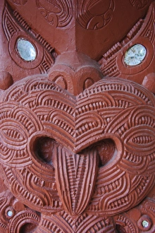 Traditional wood carved mask in the Te Puia Maori Cultural Center, Rotorura, North Island, New Zealand, Pacific Traditional wood carved mask in the Te Puia Maori Cultural Center, Rotorura, North Island, New Zealand, Pacific