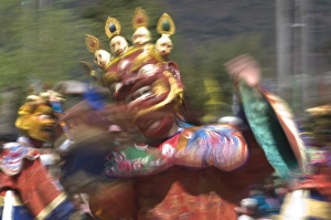 Traditionally dressed dancer at the Paro Tsechu, a religious dance ceremony Traditionally dressed dancer at the Paro Tsechu, a religious dance ceremony