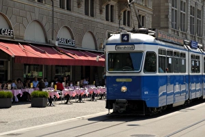 Outdoor Cafe Scene Prints: Tram and restaurant