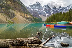 Tranquil setting of rowing boats on Moraine Lake, Banff National Park, UNESCO World Heritage Site Tranquil setting of rowing boats on Moraine Lake, Banff National Park, UNESCO World Heritage Site