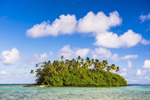 Tropical island of Motu Taakoka covered in palm trees in Muri Lagoon, Rarotonga Tropical island of Motu Taakoka covered in palm trees in Muri Lagoon, Rarotonga