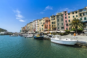 The turquoise sea frames the typical colored houses of Portovenere The turquoise sea frames the typical colored houses of Portovenere