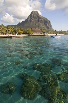 Turquoise water and the Beachcomber Le Paradis five star hotel, with Mont Brabant in the background Turquoise water and the Beachcomber Le Paradis five star hotel, with Mont Brabant in the background