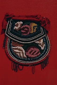 Velveteen and glass beads on pouch dating from 1850, of the Coughnawbga Mohawk of Velveteen and glass beads on pouch dating from 1850, of the Coughnawbga Mohawk of