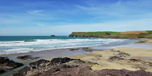 View of Atlantic surf at Polzeath beach, looking north to Pentire Headland View of Atlantic surf at Polzeath beach, looking north to Pentire Headland