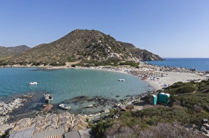 Top view of the bay with turquoise sea and the sandy beach, Punta Molentis, Villasimius Top view of the bay with turquoise sea and the sandy beach, Punta Molentis, Villasimius