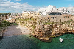 Polignano A Mare Italy Prints: View of beach and old town on limestone cliffs, Polignano a Mare, Puglia, Italy, Europe
