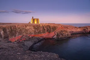 View of Castillo del Aguila o de las Coloradas at dusk, Playa Blanca, Lanzarote View of Castillo del Aguila o de las Coloradas at dusk, Playa Blanca, Lanzarote