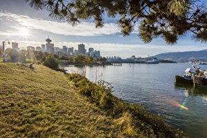 View of city skyline and Vancouver Lookout Tower from CRAB Park at Portside, Vancouver View of city skyline and Vancouver Lookout Tower from CRAB Park at Portside, Vancouver