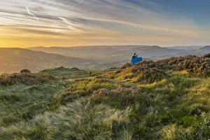 View of couple looking over Hathersage Booths from Millstone Edge View of couple looking over Hathersage Booths from Millstone Edge
