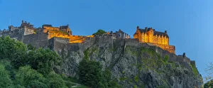View of Edinburgh Castle from Princes Street at dusk, UNESCO World Heritage Site View of Edinburgh Castle from Princes Street at dusk, UNESCO World Heritage Site