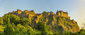 View of Edinburgh Castle from Princes Street at sunset, UNESCO World Heritage Site View of Edinburgh Castle from Princes Street at sunset, UNESCO World Heritage Site