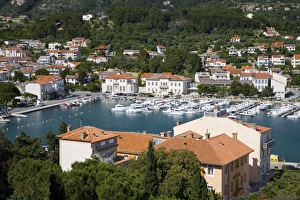 Horizontal Panorama Photography Prints: View from hillside across colourful tiled rooftops to the harbour, Rab Town