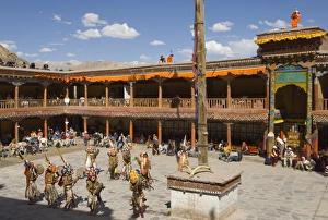 Ladakh Tourism Destination Prints: View from above of monastery courtyard with monks in